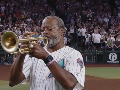 Image from linked report: WATCH: Lucky trumpeter returns for Diamondbacks' World Series victory anniversary
