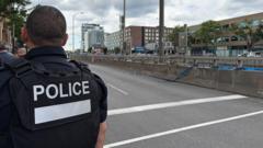 Source-feed image associated with Montreal shooting leaves officer, civilian and suspect dead