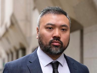 Source-feed image associated with UK border official and former Hong Kong cop jailed for spying on behalf of China