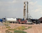 Source-feed image associated with Crews building Trump border wall in drought-hit New Mexico ordered to stop drilling wells