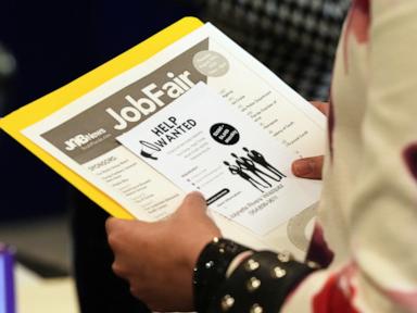 Source-feed image associated with Americans applying for jobless aid slips to 203,000 as layoffs remain low