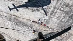 Source-feed image associated with Watch: Helicopter hovers feet from cliff face during rescue in California