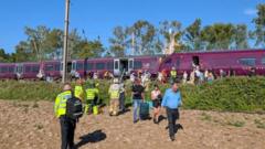 Source-feed image associated with 'People flew from their seats': Passengers describe how crash unfolded