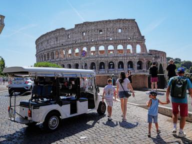 Source-feed image associated with Reckoning looms for golf carts that zip through Rome's crowded historic center