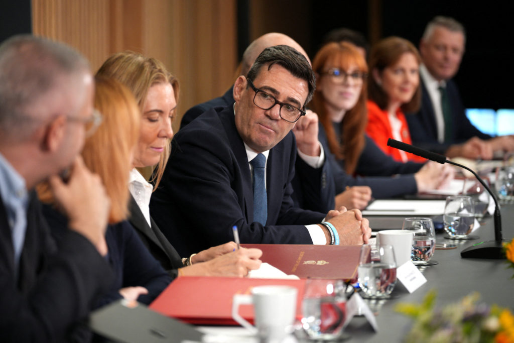 Source-feed image associated with Burnham caps busy first week as UK's new prime minister at part-time office in Manchester