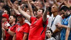 Source-feed image associated with Why Wonderwall has become England's World Cup anthem