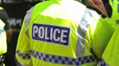 Image from linked report: Police arrest 17 in dawn raids on suspected organised crime group