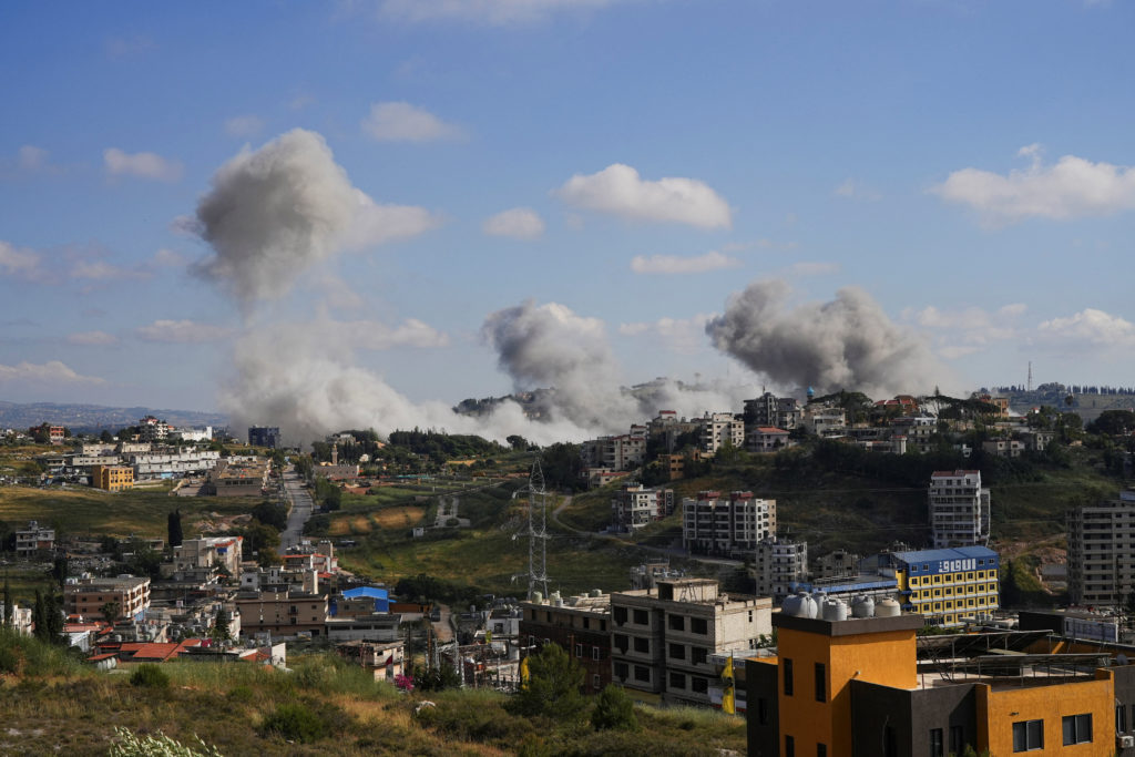 Source-feed image associated with Israel's military says it's striking Hezbollah sites as Netanyahu vows to 'increase the blows'