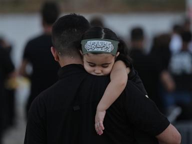 Source-feed image associated with Shiite Muslims collectively mourn to mark Muharram and Ashoura