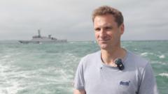 Source-feed image associated with French Navy carries out 'shooting drill' mid interview