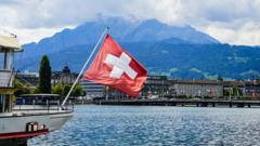 Source-feed image associated with UK-Switzerland deal to scrap roaming charges and allow Britons to use e-gates