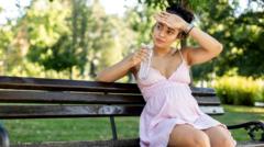 Source-feed image associated with Why heatwaves hit women harder