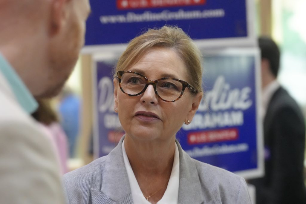Source-feed image associated with Darline Graham promotes Trump's agenda in her political debut ahead of special Senate primary