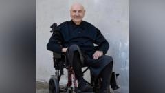 Source-feed image associated with Black Sabbath drummer explains wheelchair use