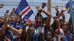 Source-feed image associated with Thousands welcome home Cape Verde footballers after stunning World Cup run
