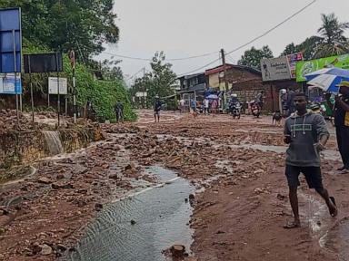 Source-feed image associated with Sri Lanka closes some schools as heavy rains trigger floods and mudslides, killing 5