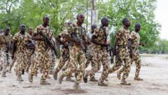 Source-feed image associated with Nigeria's president orders a 80% salary increase for junior soldiers