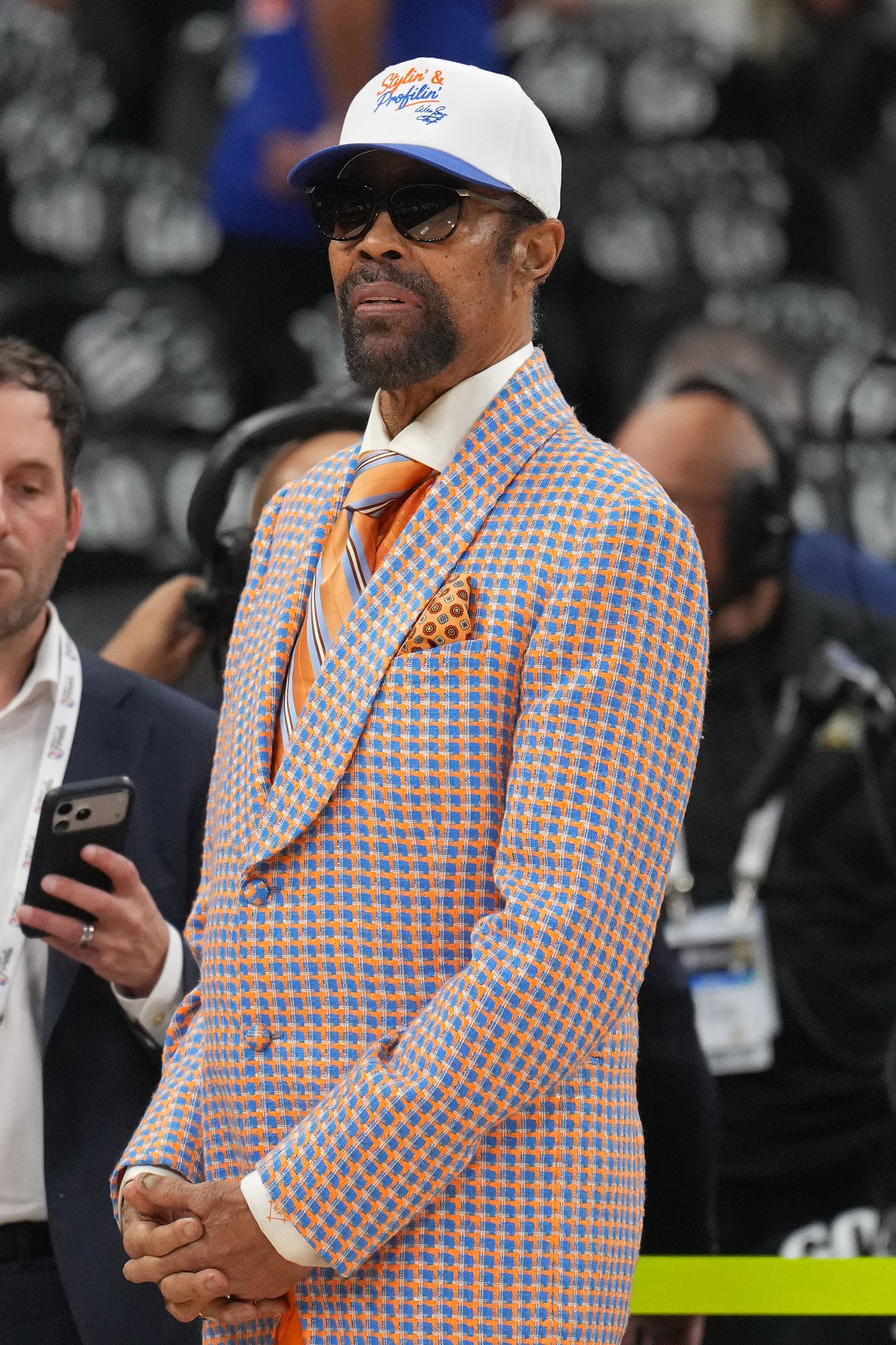 Source-feed image associated with Knicks Legend Walt 'Clyde' Frazier's Suits Are Amazing — And Made in New York