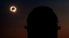 Source-feed image associated with Watch: Moment 'surreal' solar eclipse witnessed in UK and Europe