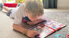 Source-feed image associated with How completing the World Cup sticker book is like having a second job