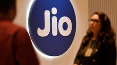 Source-feed image associated with India's biggest share sales tell the story of a country glued to its phones