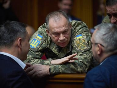 Source-feed image associated with Ukraine's Zelenskyy fires military chief after protests and names a replacement
