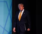 Source-feed image associated with Trump fires last members of election commission, inciting fears of midterm ‘chaos’