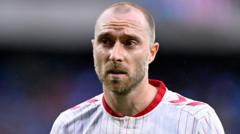 Source-feed image associated with Christian Eriksen 'in good spirits' after collapsing in Denmark game, team's doctor says