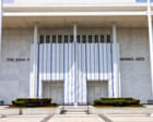 Source-feed image associated with Judge orders Trump administration to explain tarp obscuring Kennedy Center