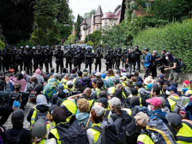 Source-feed image associated with Far-right Alternative for Germany party elects leaders as protesters and police clash