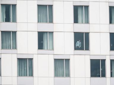 Source-feed image associated with Gunman kills a Montreal officer at a Hilton hotel before being shot dead, police say