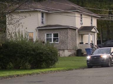 Image from linked report: Police search home following double homicide at resort amid hunt for motive