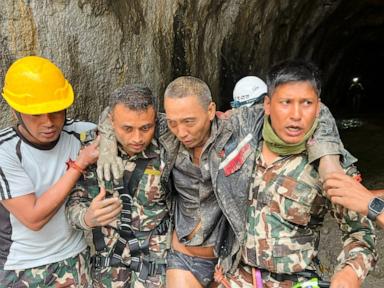 Source-feed image associated with Rescuers in Nepal pull 2 people alive from the debris 10 days after devastating floods