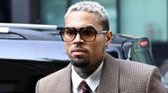 Source-feed image associated with Chris Brown ordered to pay housekeeper $13m after dog attack