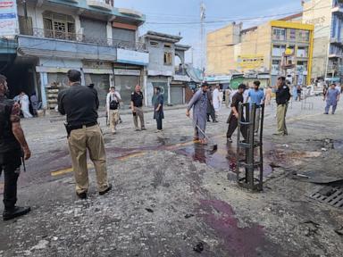 Source-feed image associated with A suicide bomber strikes an anti-militant rally in northwestern Pakistan, killing at least 14