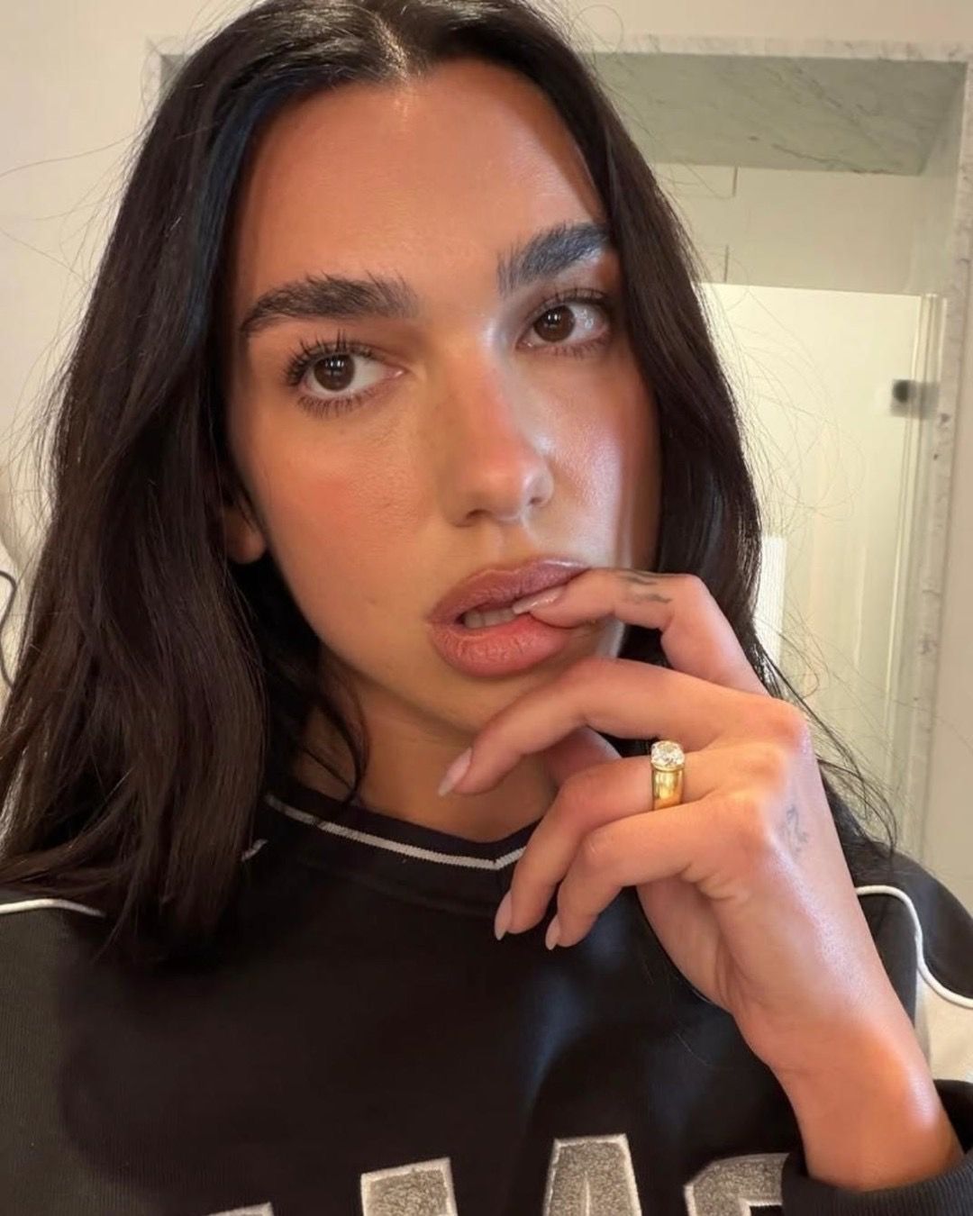 Source-feed image associated with We Finally Know Who Designed Dua Lipa’s Engagement Ring