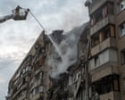 Source-feed image associated with Zelenskyy calls for ‘strong decisions’ at Nato summit as Russia kills 21 in overnight strikes on Kyiv – Europe live