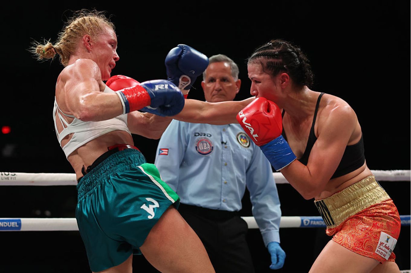 Source-feed image associated with Stephanie Han vs. Holly Holm 2 Livestream: Here’s Where to Watch the Rematch Title Bout Online