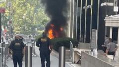 Source-feed image associated with 'Anti-ICE' army veteran started fire outside Manhattan federal building, say officials