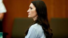 Source-feed image associated with Jury deliberating in trial of Lindsay Clancy, US woman accused of killing her children