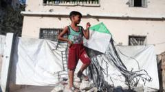 Source-feed image associated with Israel warns of 'forceful' response to kites flown from Gaza