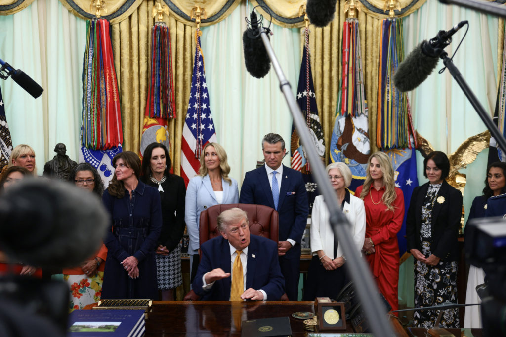 Source-feed image associated with WATCH: Trump signs executive order forming Military Spouse Commission