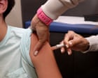 Source-feed image associated with Trump order endorses plan to halve vaccines recommended for children