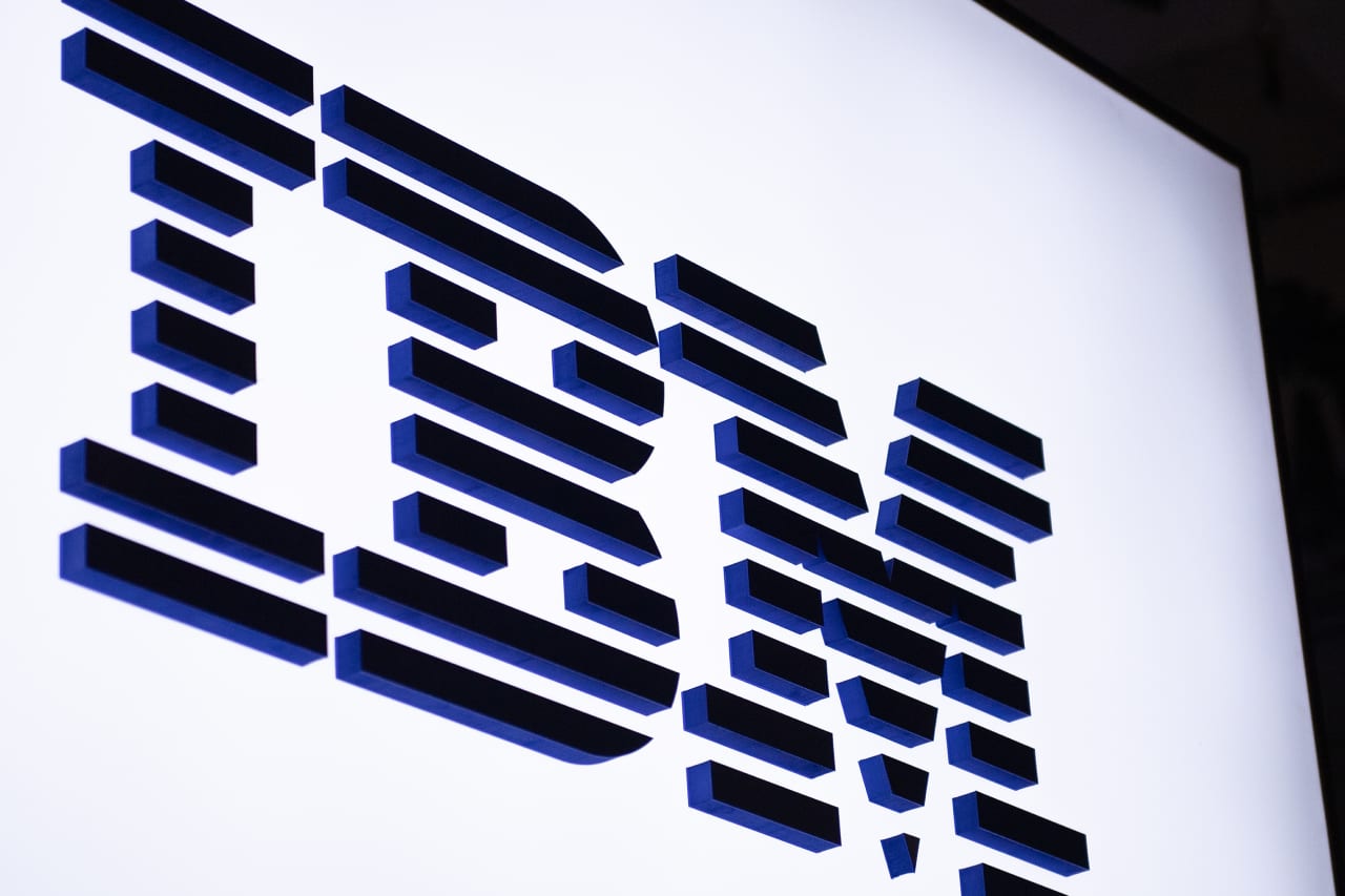 Source-feed image associated with IBM just cut its outlook, but not by as much as investors feared