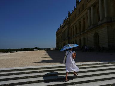 Source-feed image associated with France sizzles in a week of punishing heat that is already causing deaths