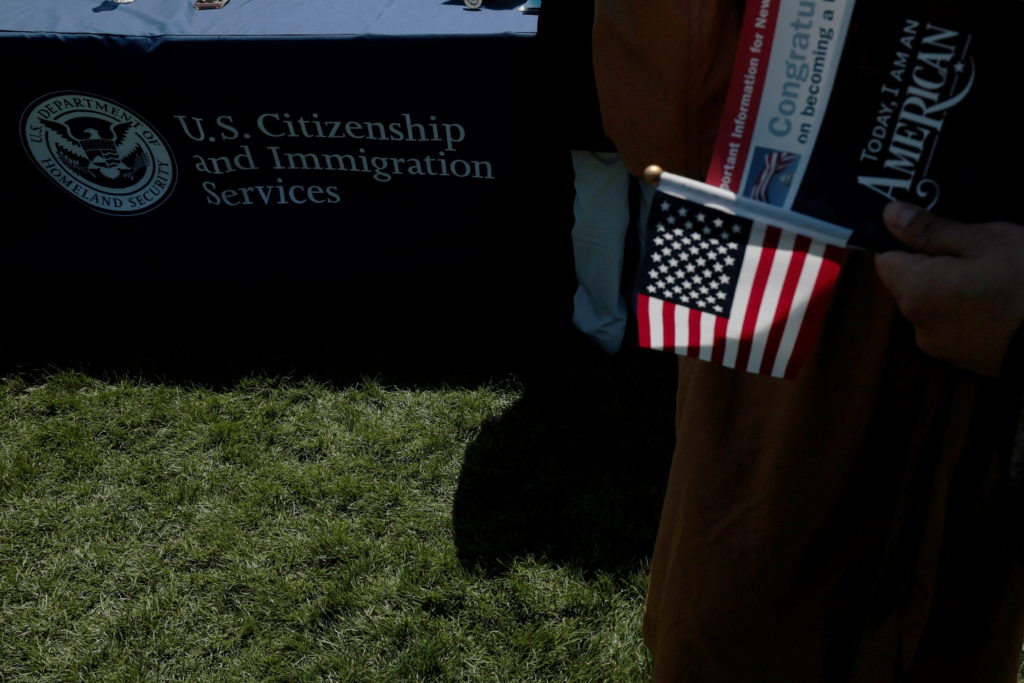 Source-feed image associated with Trump's latest immigration move clouds the path to green cards