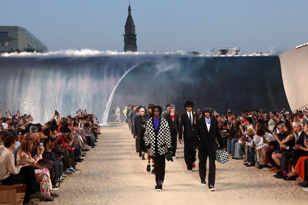 Source-feed image associated with Heat catches Europe's fashion industry unprepared as models face the sun in fur and wool