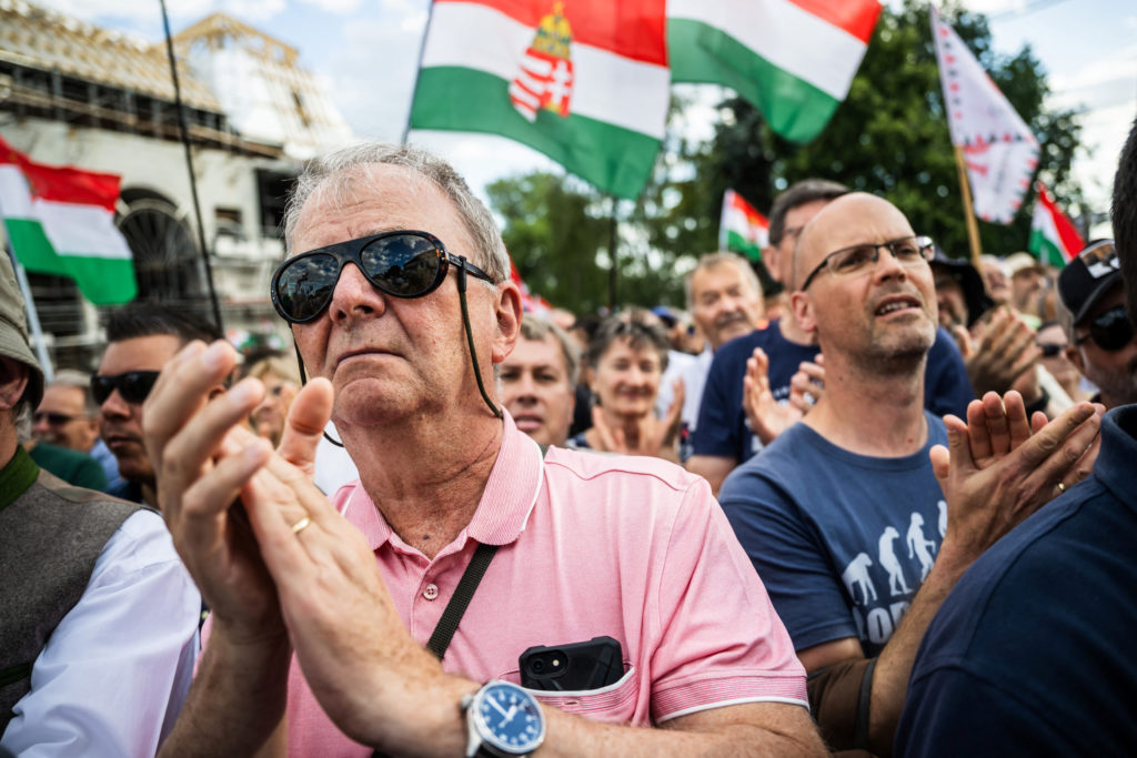 Source-feed image associated with Orb&aacute;n allies protest in Hungary against new prime minister's plans to oust President Sulyok