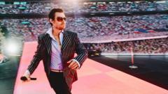Source-feed image associated with Harry Styles revisits X Factor as he kicks off Wembley residency