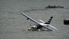 Source-feed image associated with Eight rescued from seaplane that made 'hard landing' in Manhattan river